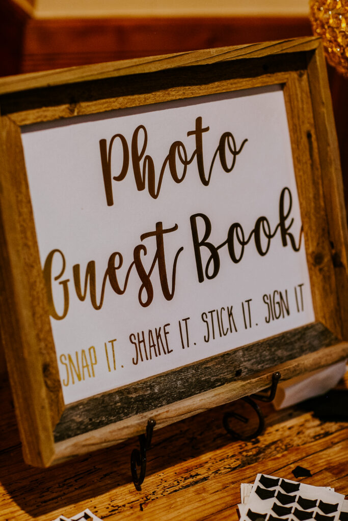 wedding reception polaroid picture sign in book